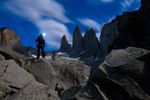 Photo by michaelclarkphoto  Lydia McDonald treks below the spires of Torres del Paine National Park...